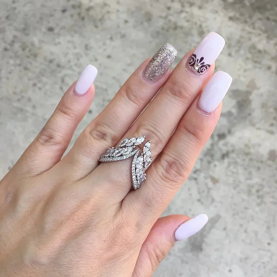 Evita – Armband und Ring mit Engelsflügeln